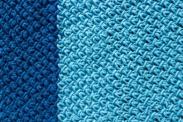 Premium Photo | Piece of two-color blue knitted fabric, background or ...