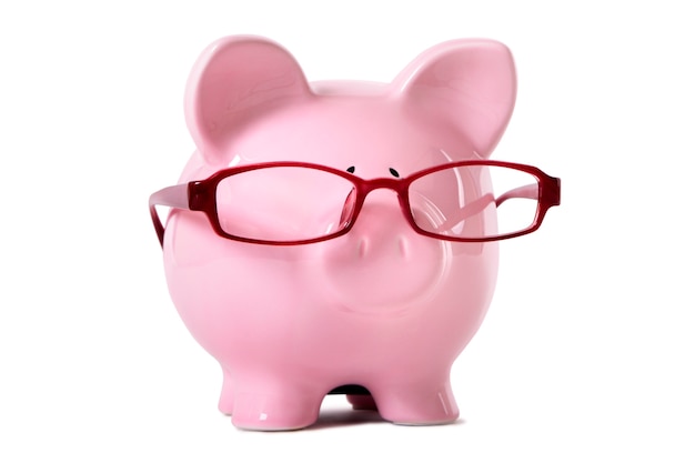 Piggybank with red glasses Free Photo
