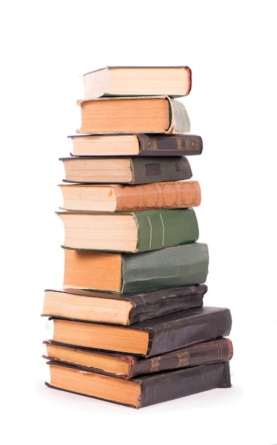 Premium Photo | Pile of books isolated on white background.