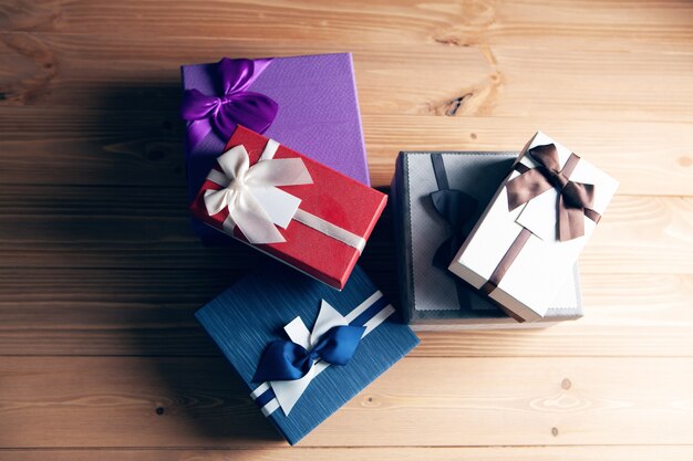 Premium Photo | A pile of gift boxes on the table