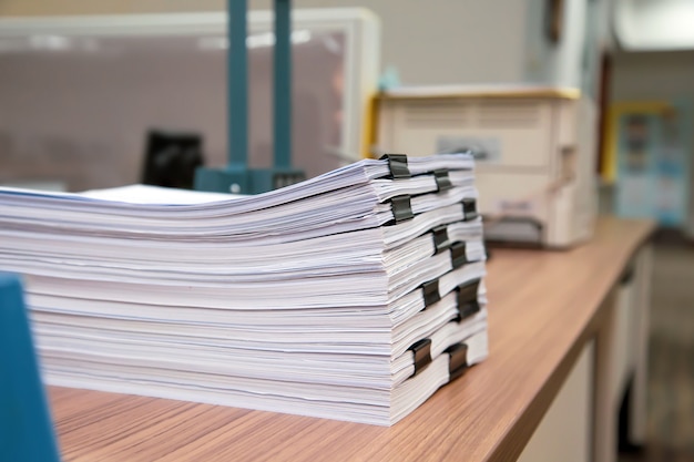 Premium Photo | Pile of a lots paperwork documents on desk office stack up.