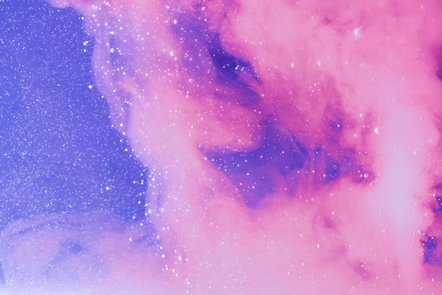 星空の夜空にピンクとブルーの色合い プレミアム写真