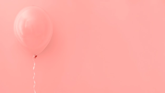無料の写真 ピンクの背景にピンクの風船