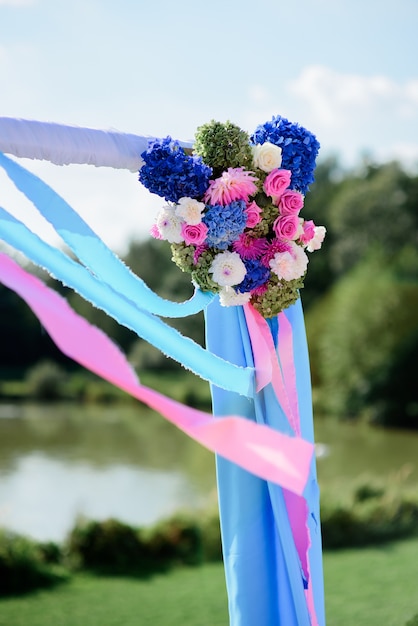 Pink And Blue Flowers And Hydrangeas Decorate Wedding Altar