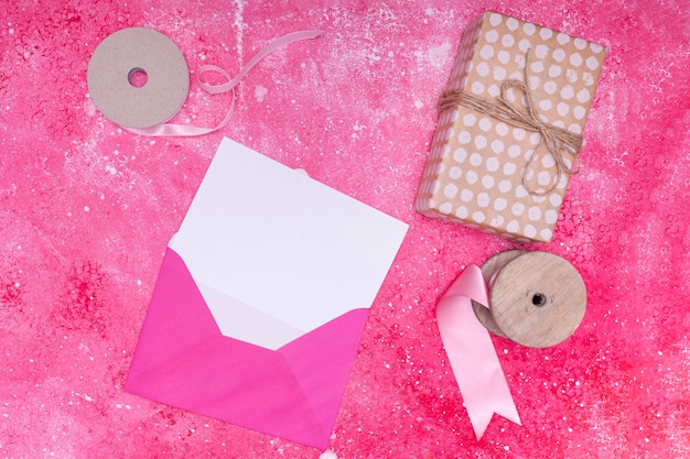 Download Pink envelope with birthday invitation mock-up | Free Photo