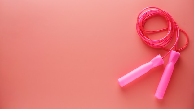 Premium Photo | Pink jumping rope or skipping rope isolated on pink