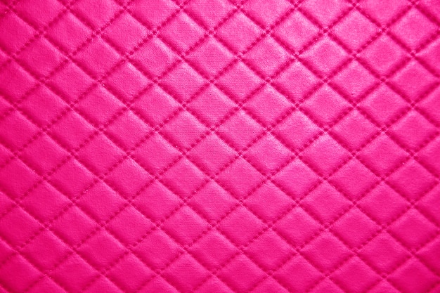 Premium Photo | Pink leather texture with seam background