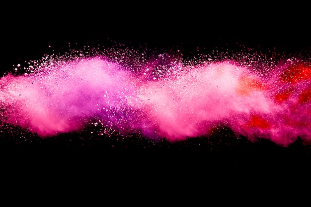 Pink Powder Explosion Isolated On Black Background Premium Photo