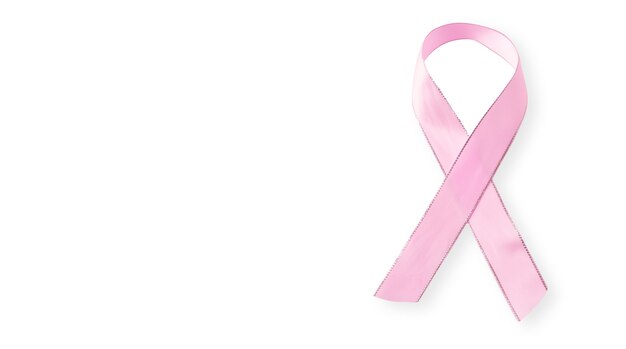 白い背景に分離されたピンクリボン ピンクリボンの形をしたキャンペーンシンボルを使用した世界中の乳がん対策キャンペーン コピースペース プレミアム写真
