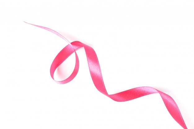 Premium Photo | Pink ribbon isolated on white