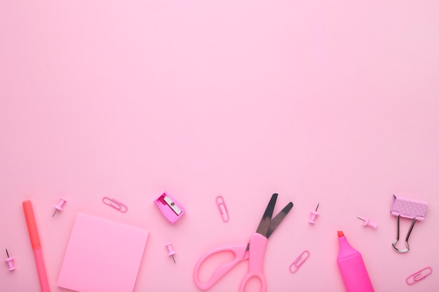 Premium Photo | Pink school accessories on pink background. back to ...