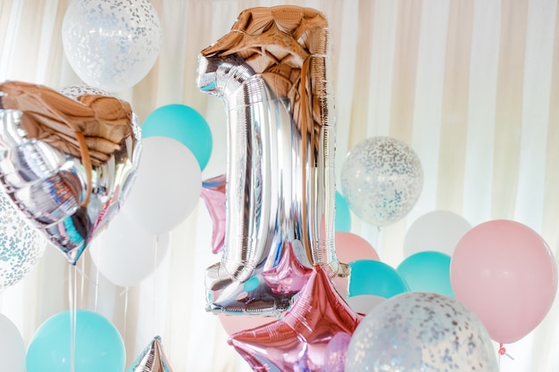 Pink Silver And Blue Inflatable Balloons On Ribbons Photo
