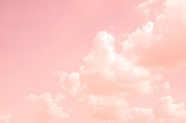Premium Photo | Pink sky with white clouds with blurred pattern background