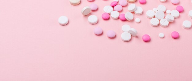 Premium Photo Pink And White Pills On Pink