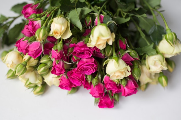 premium-photo-pink-and-white-rose-bush-collected-in-a-bouquet