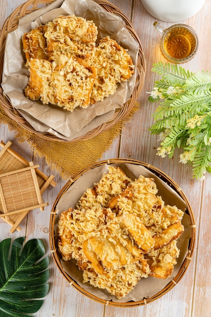 Premium Photo Pisang Goreng Is A Fritter Made By Deep Frying Battered Plantain In Hot Oil