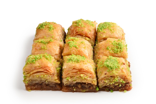 Premium Photo | Pistachio baklava on a white background. dessert.