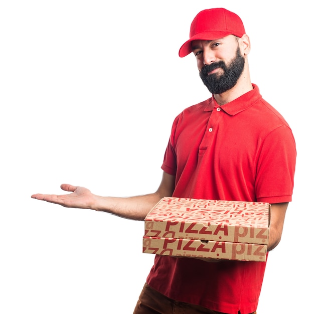 Download Pizza delivery man presenting something Photo | Free Download