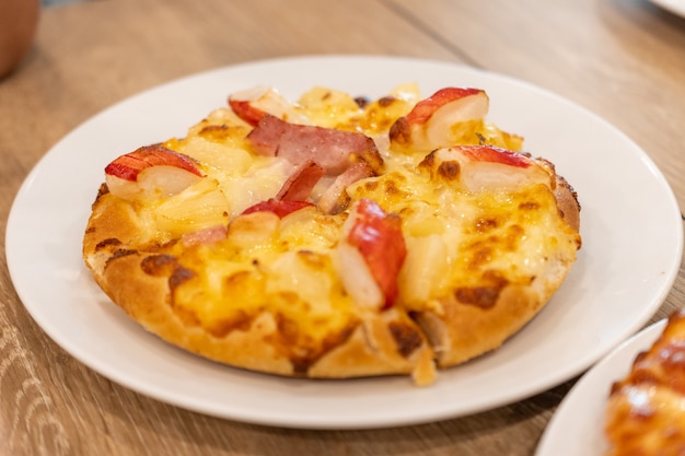 Premium Photo Pizza Hawaiian With Pineapple And Ham