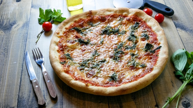 Premium Photo | Pizza on a restaurant table