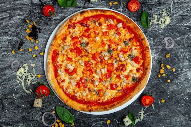 Pizza with tomato sauce mozzarella cabanos mashed and potatoes Premium Photo