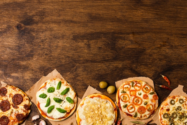 Premium Photo | Pizza on wood table with copy space