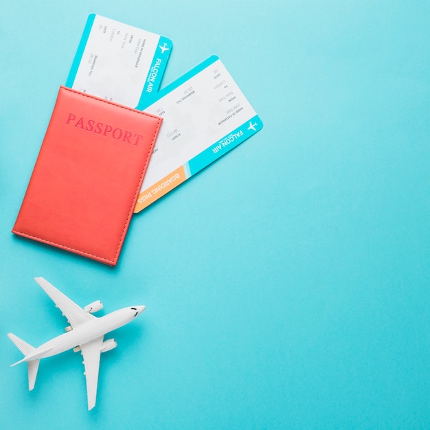 Plane passport and boarding pass for travel Free Photo