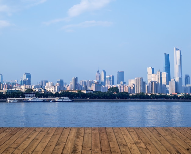 Free Photo | Planks with river and the city in the distance