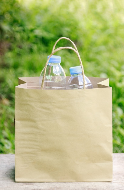 Premium Photo | Plastic bottle in paper box