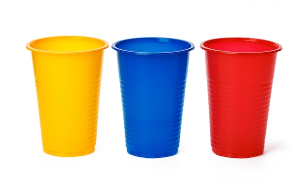 Premium Photo | Plastic cups on white background