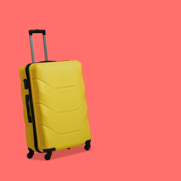 yellow small suitcase