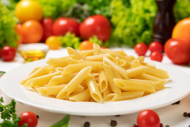 Premium Photo | Plate of cooked italian penne pasta