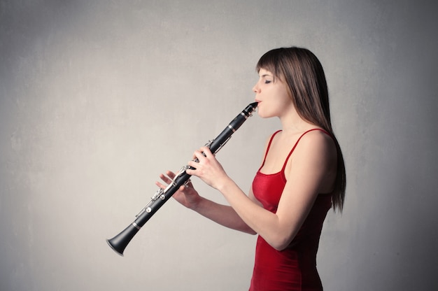 premium-photo-playing-on-a-clarinet