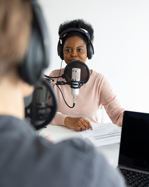 Premium Photo | Podcasters african american and european woman with ...