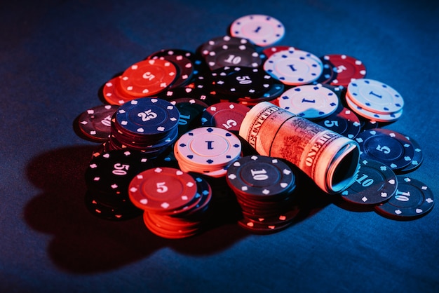 Premium Photo | Poker playing chips placed on a bet.