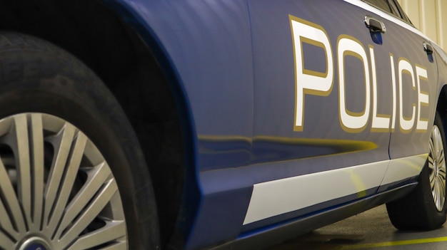 Premium Photo | Police car in blue with the word police in english