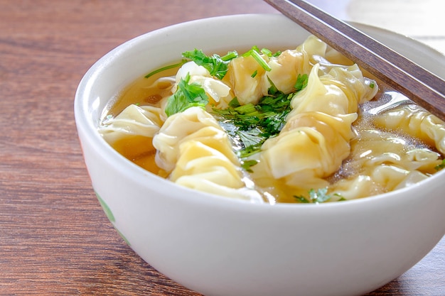 Porkwonton and dumpling in clear soup Premium Photo