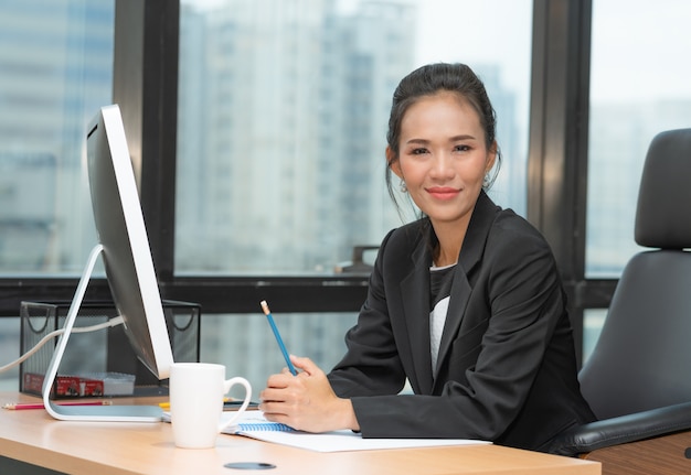 Premium Photo Portrait Of Asian Senior Business Woman Sitting On Her