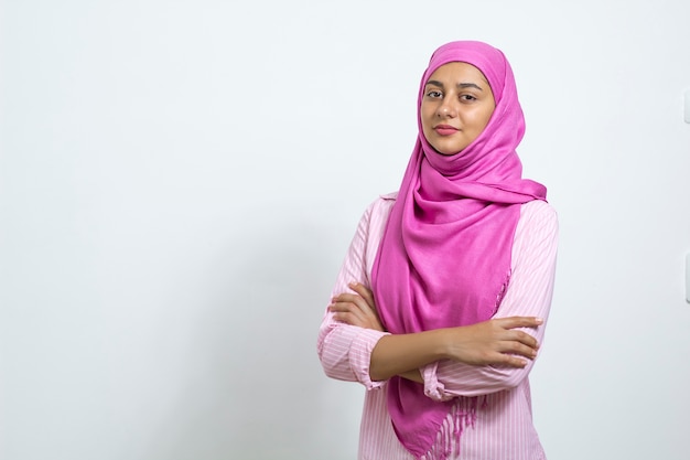 Portrait Of An Attractive Arab Girl In Hijab On A White Background
