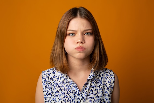 Premium Photo Portrait Of Attractive Young Woman With Puffy Cheeks