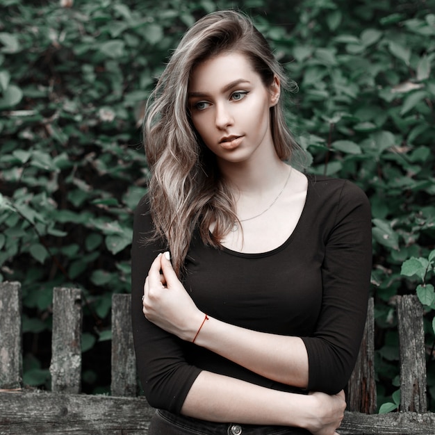 Premium Photo | Portrait of a beautiful country girl in a black tshirt ...