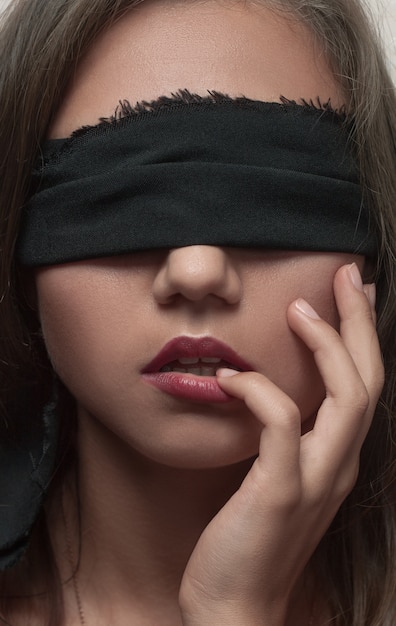 Premium Photo | Portrait of beautiful girl with blindfolded and clean face