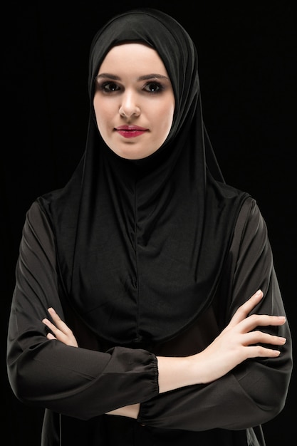  Portrait  of beautiful positive young muslim woman wearing 