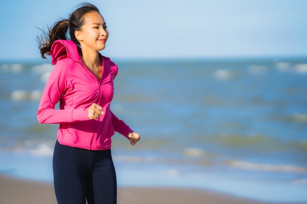 Free Photo | Portrait beautiful young asian woman running or exercise on  the tropica nature landscape of beach