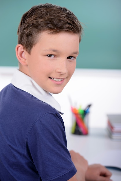 Premium Photo | Portrait of boy at school classroom