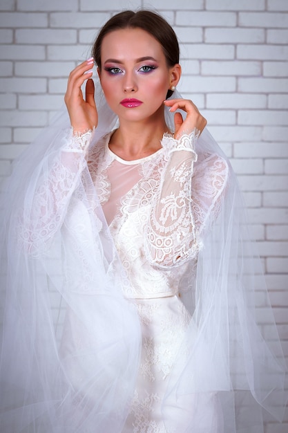 Premium Photo | Portrait bride wearing the wedding dress
