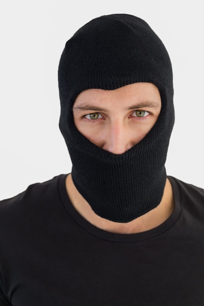 Premium Photo | Portrait of burglar wearing a balaclava