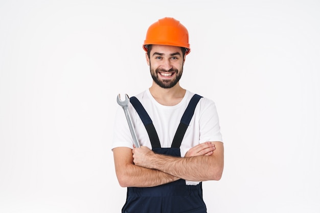 Premium Photo | Portrait of cheerful positive young man builder in ...