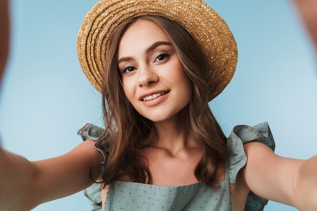 Premium Photo Portrait Of A Cheerful Woman In Dress And Summer Hat