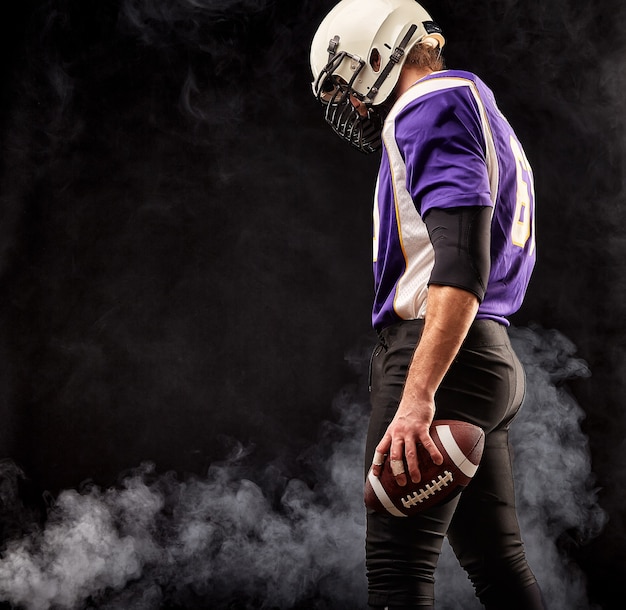 Portrait Close Up American Football Player Bearded Without A Helmet With The Ball In His Hands Concept American Football Patriotism Close Up Premium Photo